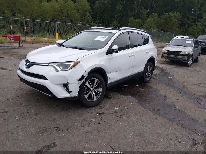 2016 Toyota RAV 4, Front & Rear, IAAI, VIN JTMWFREV6GJ095167 — photo 2