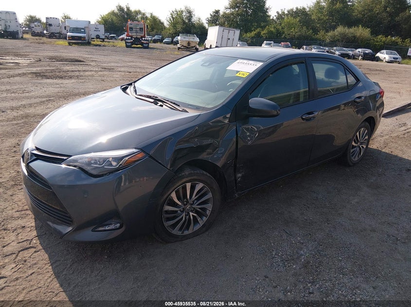2018 Toyota Corolla, Левый перёд, IAAI, VIN 5YFBURHE2JP787073 — фото 2