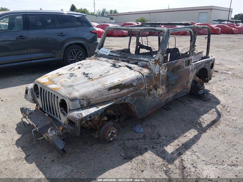 2004 Jeep Wrangler, Полностью сгорел, IAAI, VIN 1J4FA59S24P738429 — фото 2