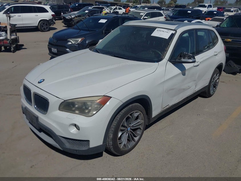 2014 BMW X1, Левый бок, IAAI, VIN WBAVM5C59EVV91435 — фото 2