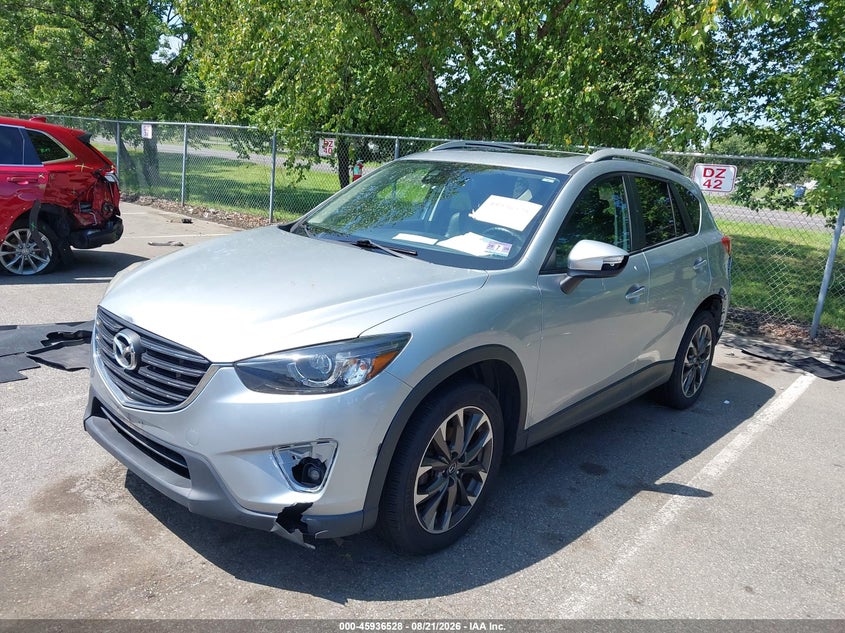 2016 Mazda CX-5, Left & Right Side, IAAI, VIN JM3KE4DY5G0668959 — photo 2