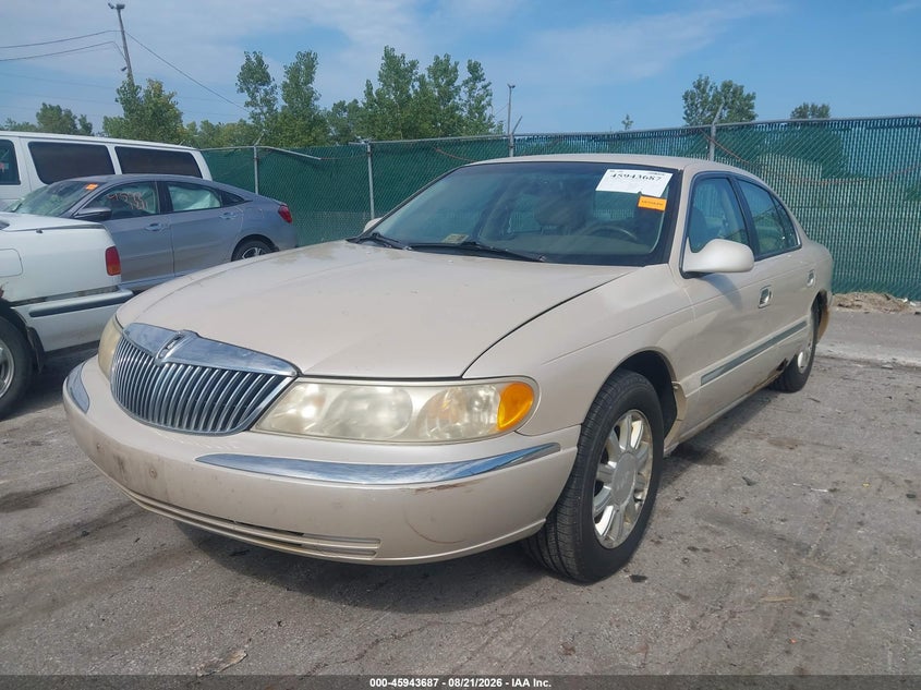 2000 Lincoln Continental, Normal Wear & Tear, IAAI, VIN 1LNHM97V7YY792685 — photo 2