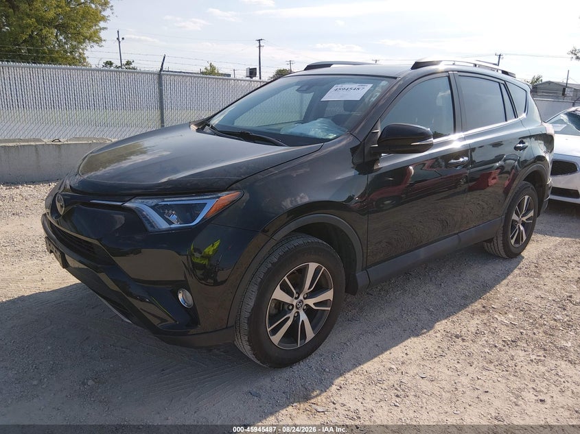 2018 Toyota RAV 4, По колу, IAAI, VIN 2T3RFREV1JW704770 — фото 2