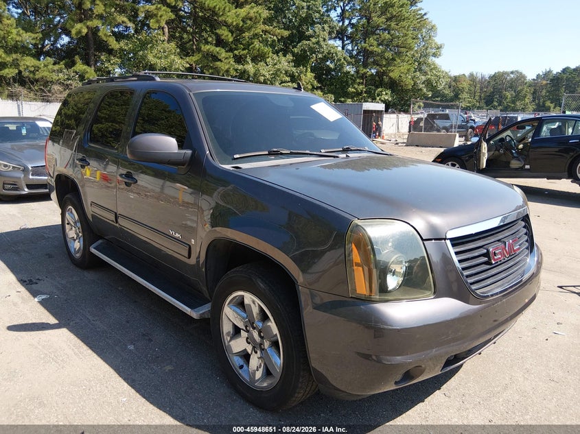 2010 GMC YUKON auction photo 1