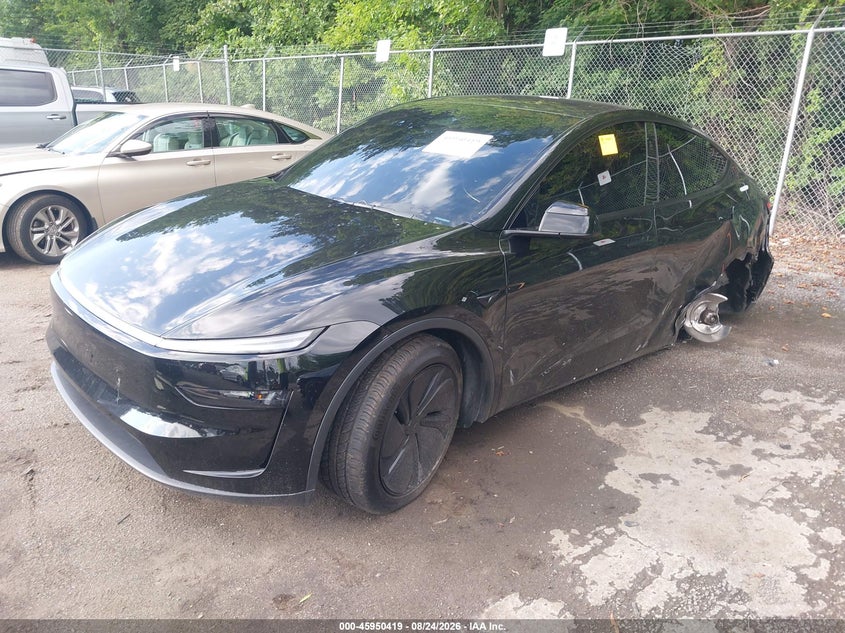 2026 Tesla Model Y, Left Rear, IAAI, VIN 7SAYGDEE9TF552728 — photo 2