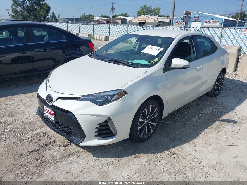 2018 Toyota Corolla, Storm Damage, IAAI, VIN 5YFBURHE1JP835372 — photo 2