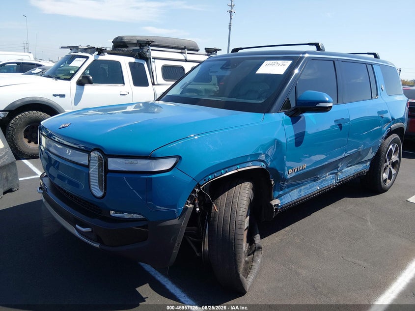2023 Rivian R1S, Left Side, IAAI, VIN 7PDSGABA5PN025336 — photo 2