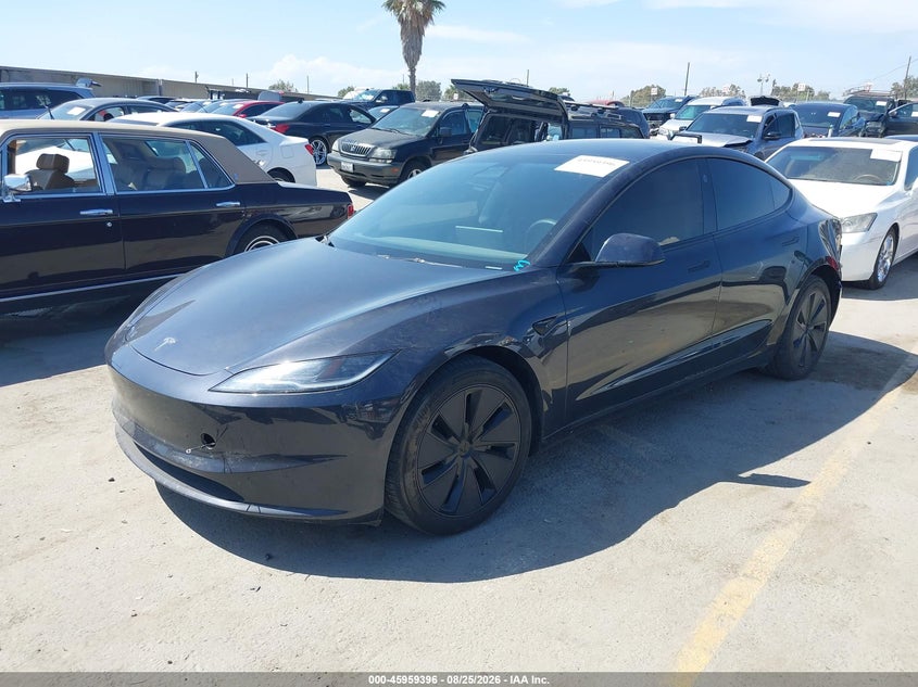 2025 Tesla Model 3, Left Rear, IAAI, VIN 5YJ3E1EB1SF882539 — photo 2