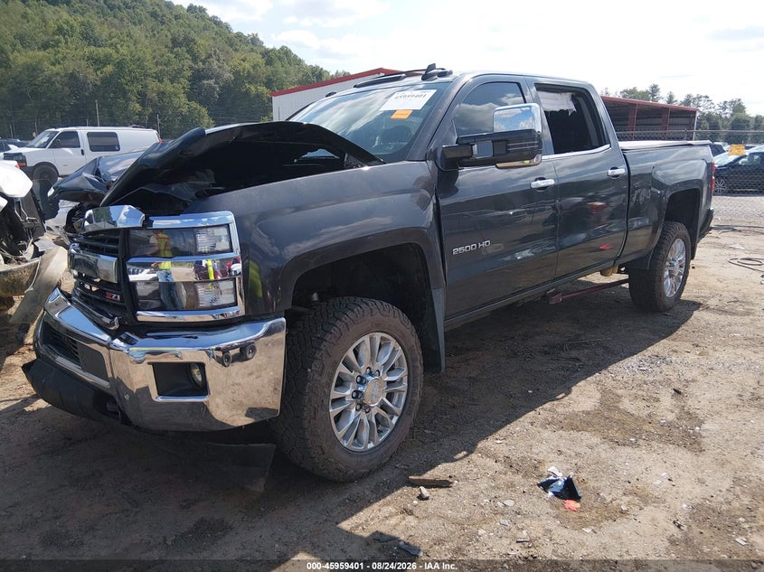 2016 Chevrolet Silverado, Front & Rear, IAAI, VIN 1GC1KWE88GF159551 — photo 2