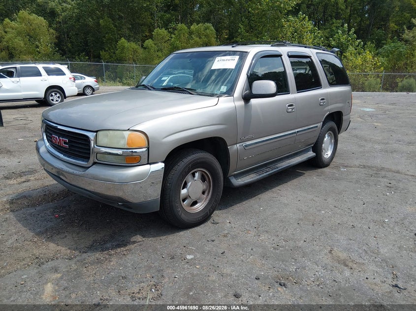 2003 GMC Yukon, Front & Rear, IAAI, VIN 1GKEC13Z03R217761 — photo 2