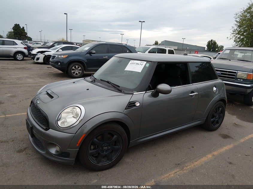 2009 MINI Cooper, По кругу, IAAI, VIN WMWMF735X9TX40521 — фото 2