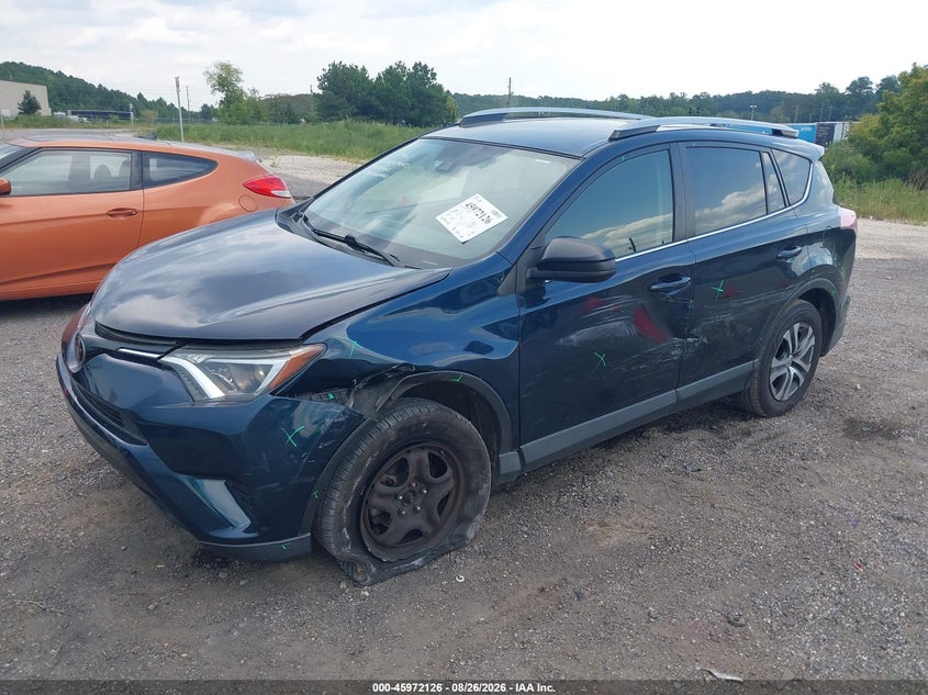 2018 Toyota Rav4 Le, Left Side, IAAI, VIN JTMZFREV4JJ187527 — photo 2