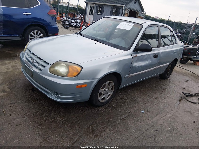 2004 Hyundai Accent, Left Side, IAAI, VIN KMHCG45C54U538240 — photo 2