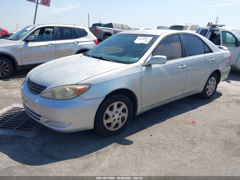 2002 Toyota Camry, Normal Wear & Tear, IAAI, VIN 4T1BE32K12U097386 — photo 2