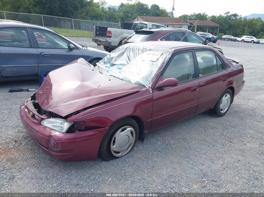1998 Toyota Corolla, Left & Right Side, IAAI, VIN 2T1BR18E3WC054332 — photo 2