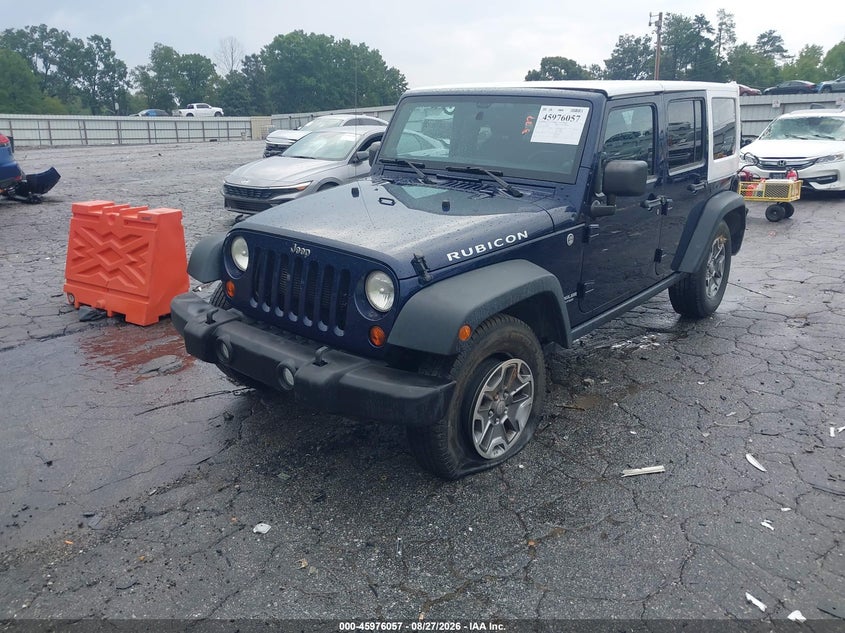 2013 Jeep Wrangler, Удар ззаду, IAAI, VIN 1C4HJWFG0DL560211 — фото 2