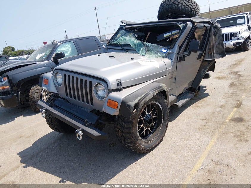 2000 Jeep Wrangler, Переворот, IAAI, VIN 1J4FA49S8YP727385 — фото 2