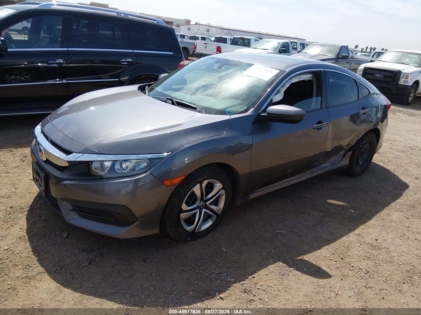 2016 Honda Civic, Левый бок, IAAI, VIN 19XFC2F58GE211058 — фото 2