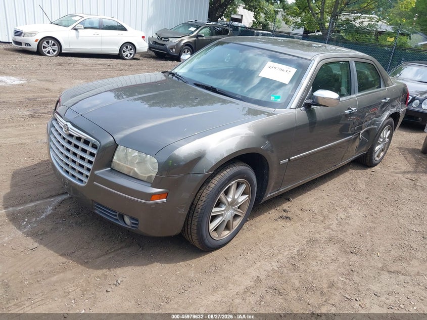 2010 Chrysler 300, Левый бок, IAAI, VIN 2C3CK5CV0AH156861 — фото 2