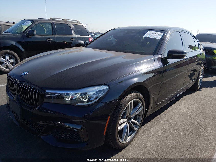 2019 BMW 7er, Левый зад, IAAI, VIN WBA7E2C51KB217712 — фото 2