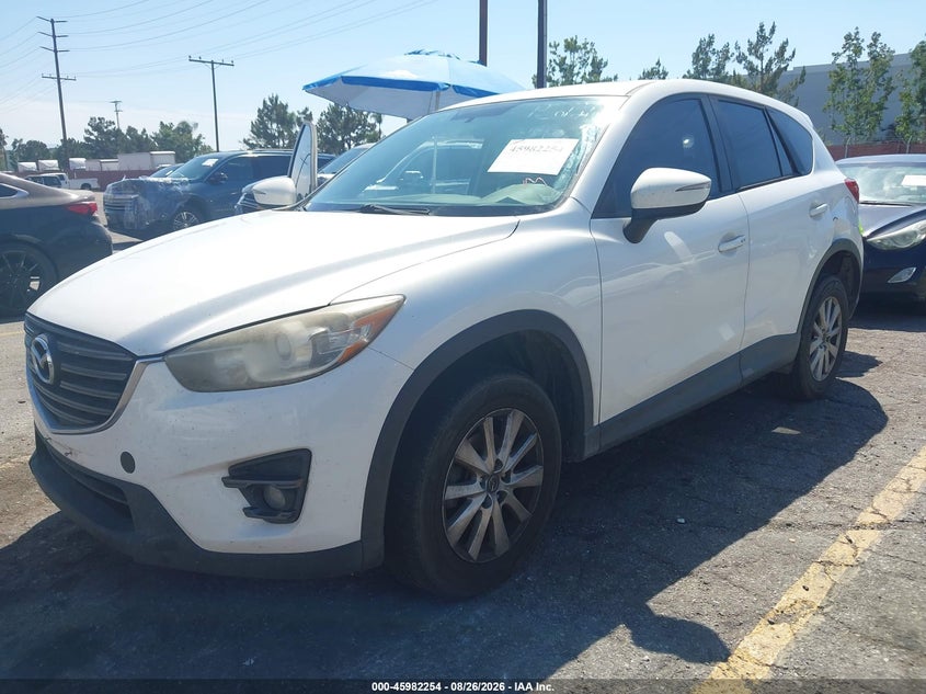 2016 Mazda CX-5, Левый зад, IAAI, VIN JM3KE2CY4G0688464 — фото 2