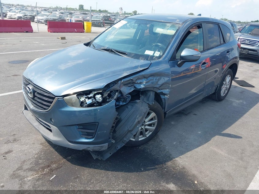 2016 Mazda CX-5, Left Front, IAAI, VIN JM3KE4BY0G0662179 — photo 2