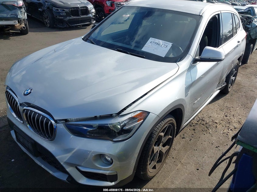 2016 BMW X1, Left Side, IAAI, VIN WBXHT3C33G5F65699 — photo 2