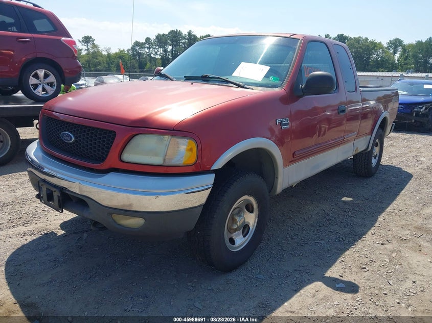 2002 Ford F-150, Обычный износ, IAAI, VIN 1FTRX18W42NA84136 — фото 2