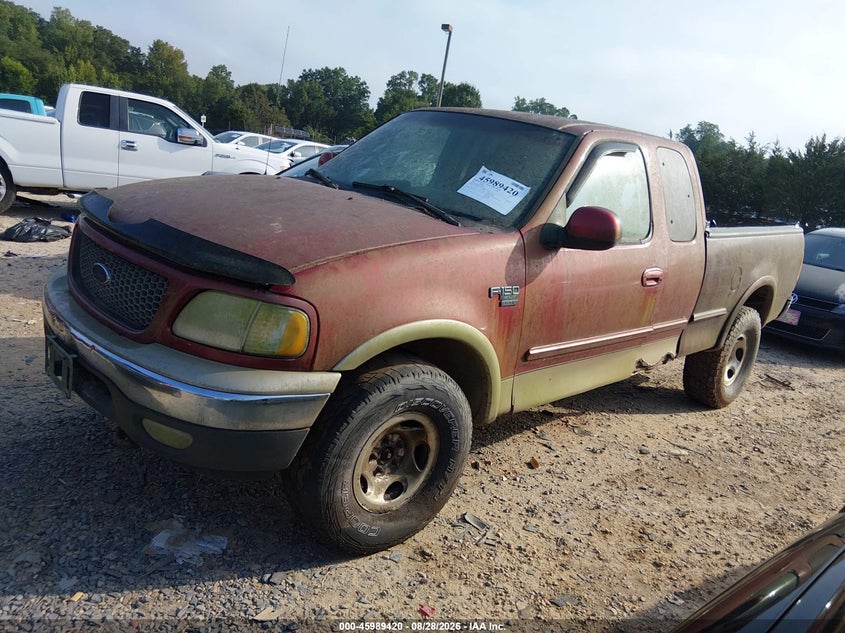 2000 Ford F-150, Normal Wear & Tear, IAAI, VIN 1FTRX18W8YNA60527 — photo 2