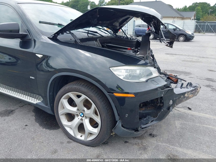 BMW X6 2014 VIN 5UXFG2C58E0H09891