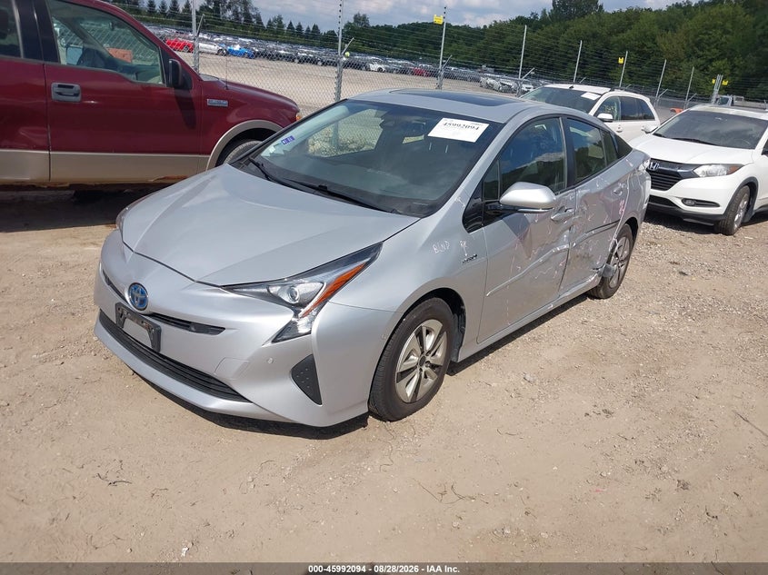 2018 Toyota Prius, Left Side, IAAI, VIN JTDKARFU0J3553106 — photo 2