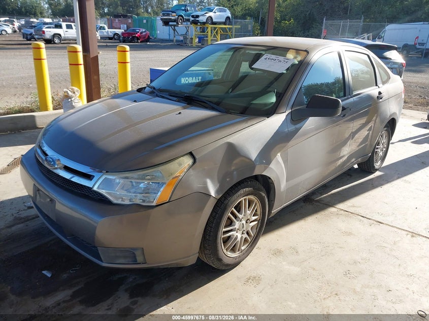 2009 Ford Focus, Left Side, IAAI, VIN 1FAHP35N49W140329 — photo 2