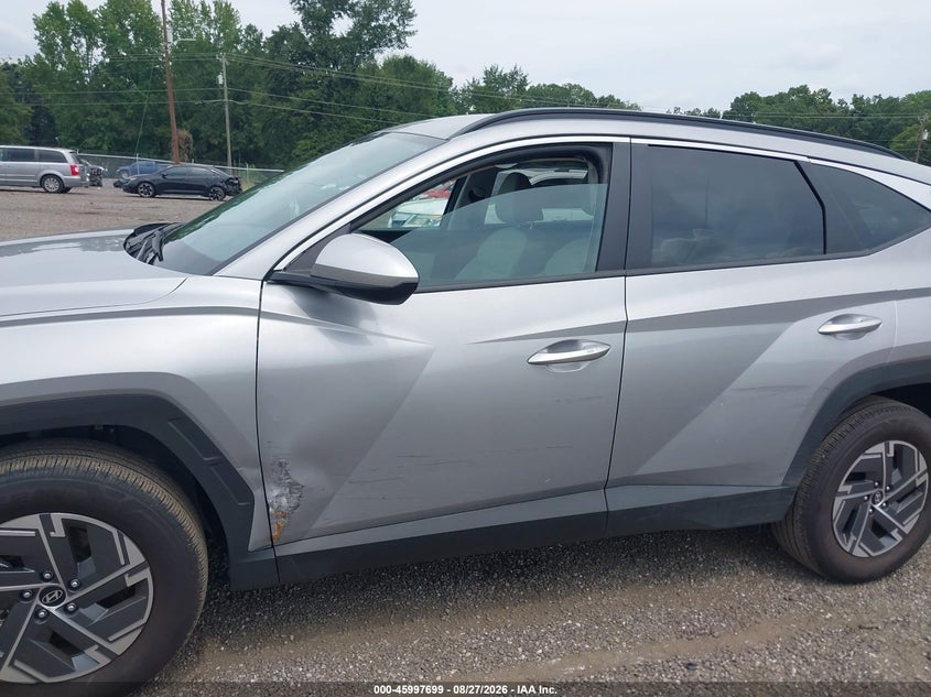 2025 HYUNDAI TUCSON HYBRID auction photo 6