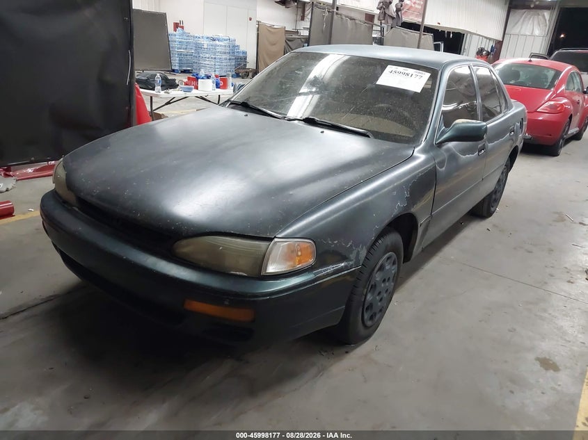 1995 Toyota Camry, Левый зад, IAAI, VIN JT2SK12E2S0321051 — фото 2