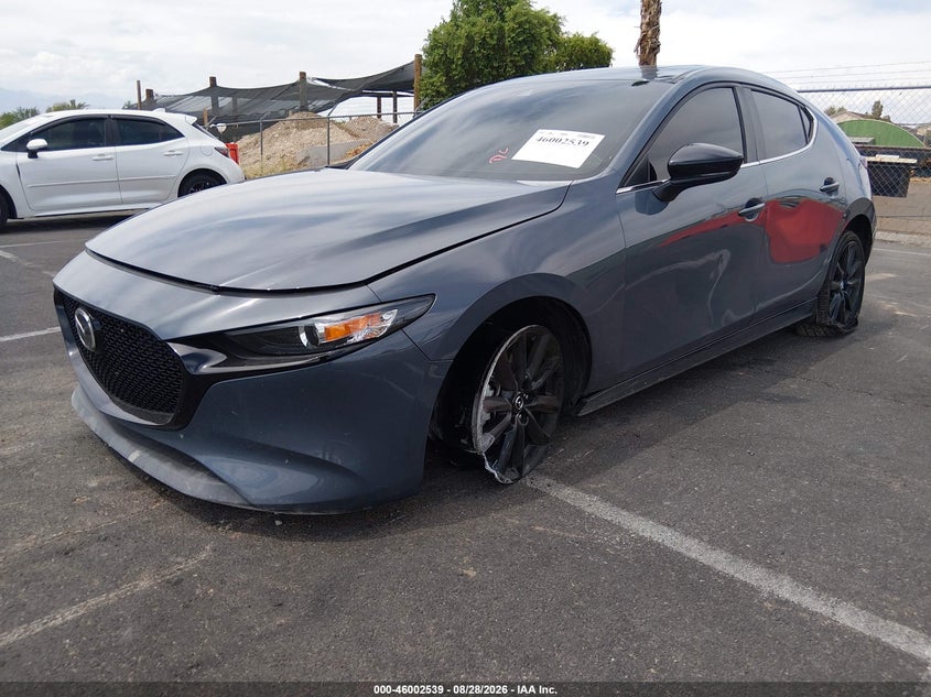2023 Mazda 3, Front & Rear, IAAI, VIN JM1BPBLM9P1612409 — photo 2