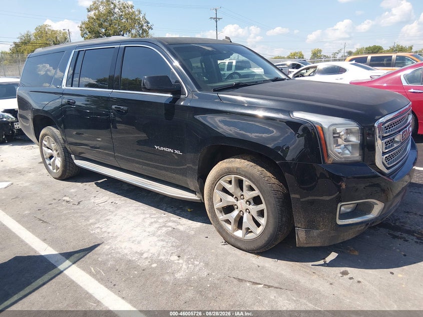 2015 GMC YUKON XL auction photo 1
