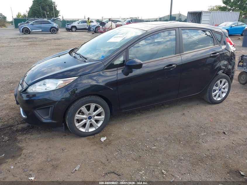 2011 Ford Fiesta, Левый зад, IAAI, VIN 3FADP4EJ6BM170844 — фото 2