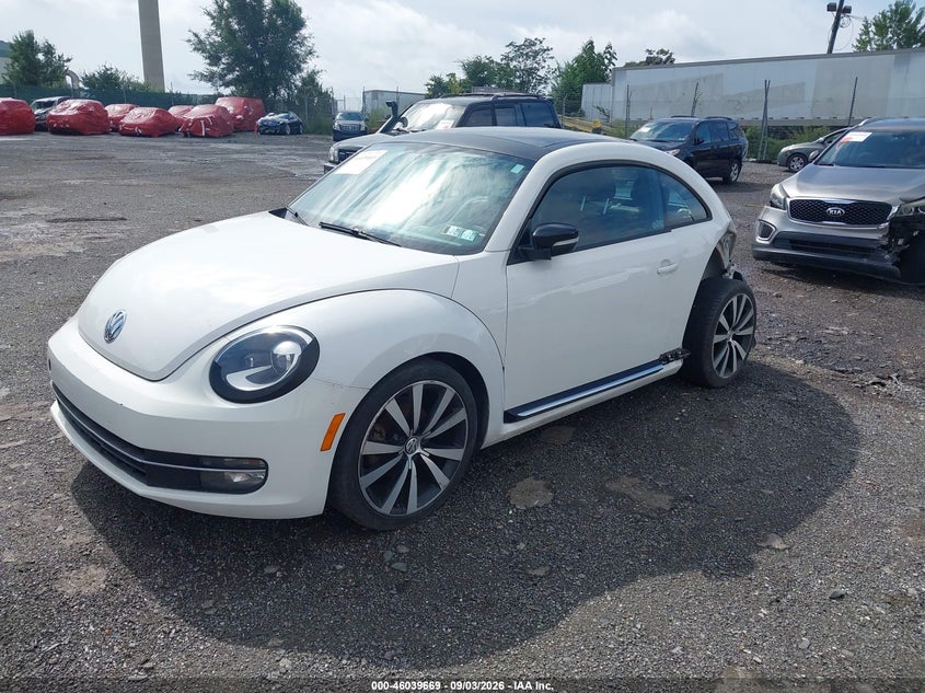 2012 Volkswagen Beetle, Левый зад, IAAI, VIN 3VWVA7AT5CM655399 — фото 2