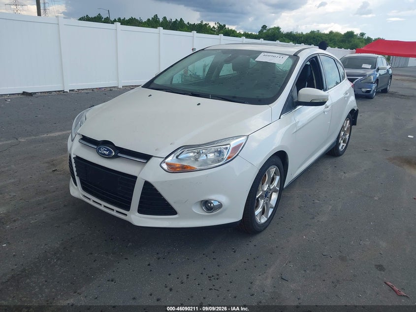 2012 Ford Focus, Левый зад, IAAI, VIN 1FAHP3M24CL277514 — фото 2