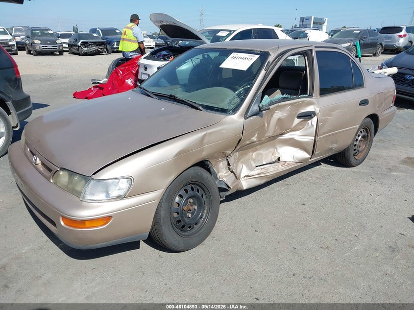 1997 Toyota Corolla, Left Side, IAAI, VIN 1NXBA02E8VZ610156 — photo 2