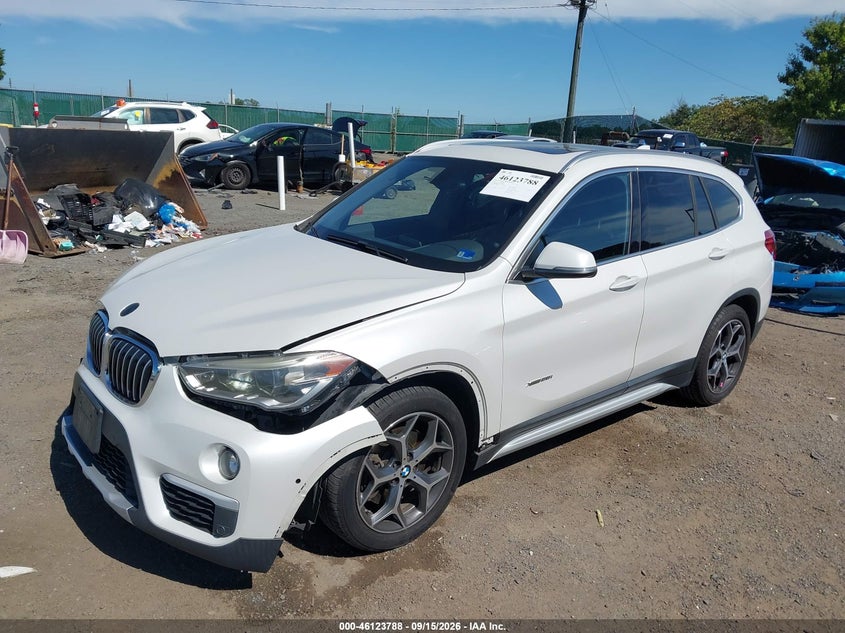 2016 BMW X1, Front End, IAAI, VIN WBXHT3C38G5F64404 — photo 2