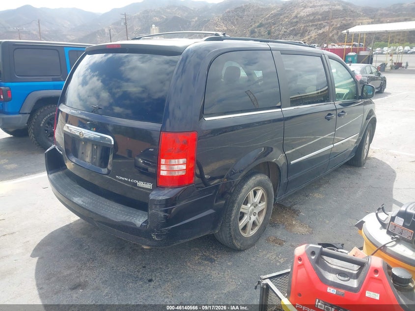 Vin: 2a4rr5d17ar149715, lot: 46640300, chrysler town & country touring 20104