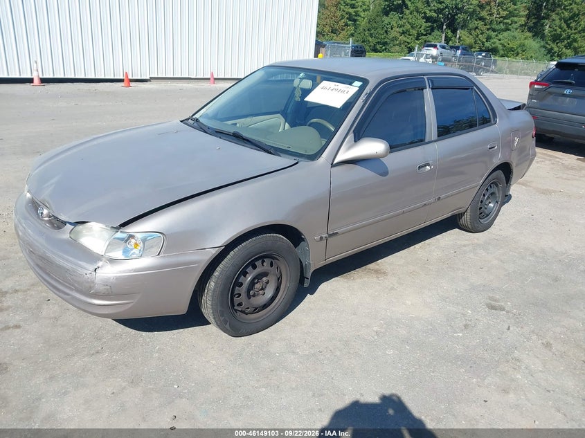 2000 Toyota Corolla, Перед і зад, IAAI, VIN 2T1BR12E9YC345090 — фото 2