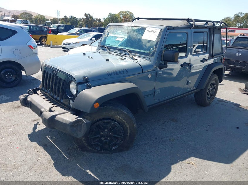 2014 Jeep Wrangler Unlimited Willys Wheeler, Оба бока, IAAI, VIN 1C4BJWDG0EL309747 — фото 2