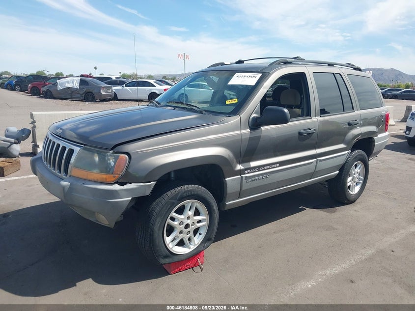 1999 Jeep Grand Cherokee Laredo, Right Side, IAAI, VIN 1J4GW58S3XC671794 — photo 2