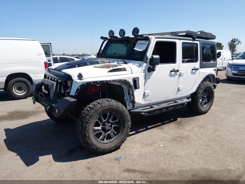 2016 Jeep Wrangler Unlimited Sport, Left Rear, IAAI, VIN 1C4BJWDG0GL194196 — photo 2