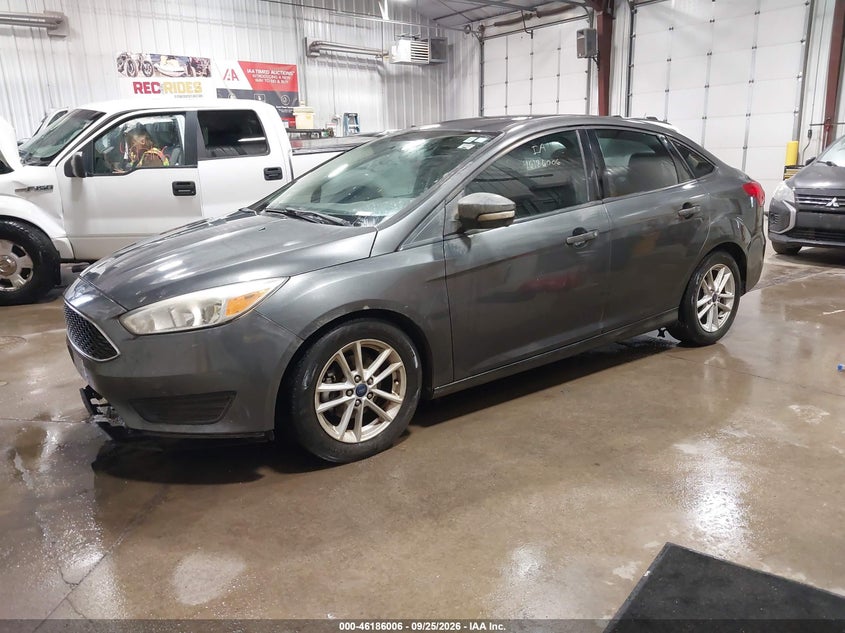 2016 Ford Focus, Механіка, IAAI, VIN 1FADP3F20GL386893 — фото 2