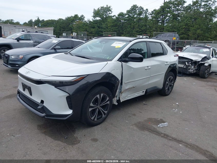 2024 Toyota bZ4X, Left Side, IAAI, VIN JTMABACA8RA069289 — photo 2