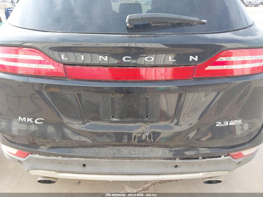 LINCOLN MKC 2015 VIN 5LMTJ2AH0FUJ10079