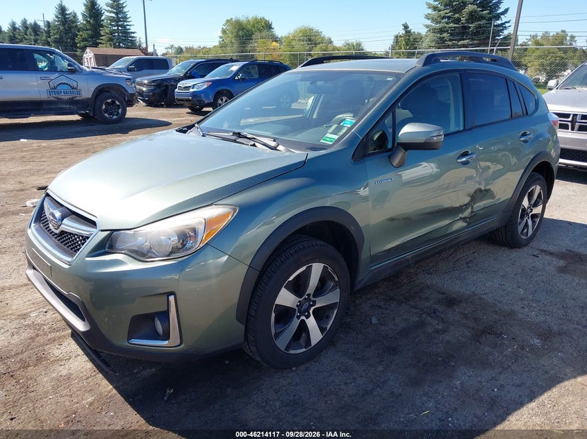 2016 Subaru Crosstrek Hybrid Touring, Left Side, IAAI, VIN JF2GPBLC1GH216108 — photo 2
